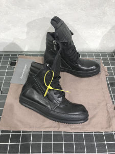 รองเท้าบู๊ทส์ผู้ชายหนังแท้ทรงปากกว้าง ด้านข้างซิป ส้นหนา รองเท้าบู๊ทส์สไตล์สตรีทสีเข้มสำหรับผู้ชายและผู้หญิง