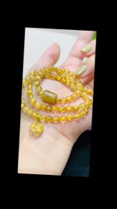 vòng tay nữ cỏ 4 lá thạch anh tóc vàng tự nhiên mix charm túi tiền tóc vàng bọc bạc vòng tay đá phong thuỷ hợp mệnh thổ mệnh kimtrang sức thiết kế đủ hoá đơn thẻ bảo hành