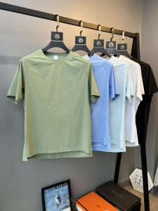 Outdoor Laser Perforated Ice Silk Cool Feeling Breathable Quick Dry Short Sleeve round Neck T-Shirt for Men Summer Thin Modern Style