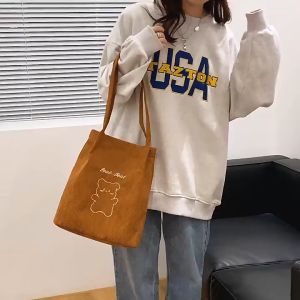 กระเป๋าผ้าใบน่ารักผู้หญิงการ์ตูนเย็บปักถักร้อยกระเป๋าสะพายใหม่ญี่ปุ่นภายในกระเป๋าผ้าลูกฟูกนักเรียนในชั้นเรียน 2-3 วันมาถึง