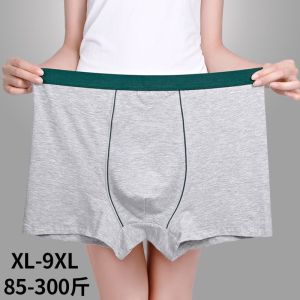 กางเกงบ็อกเซอร์ชายผ้าฝ้ายแท้ระบายอากาศได้ดี ทรงหลวม ทรงสี่เหลี่ยม กางเกงบ็อกเซอร์ทรงสามเหลี่ยมสีแดง ทรงเอวกลาง สำหรับเยาวชน