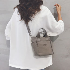 2025 New Womens Small Canvas Tote Bag Lightweight Large Capacity Crossbody Handbag Commuter Bag Fashionable Pure Color