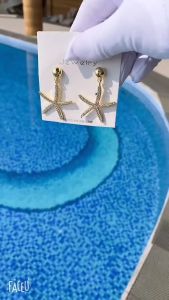 ต่างหูรูปปลาดาวประดับด้วยเพชรเพทาย รูปดาวทะเล ก้านต่างหูเงินแท้925 ดีไซน์หรูหรา ไม่ทำให้เกิดอาการแพ้ ไม่ดำไม่ลอกสี SS-5