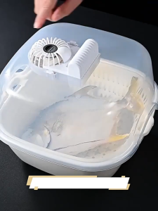 Mini multi-functional household defrosting box with rapid defrosting and UVC ultraviolet sterilization function.