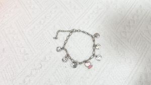 Sanrio | Cute Hello Kitty Chain Bracelet Zinc Alloy with Multiple Kitty Head Charms Silver Tone Adjustable Wristband Jewelry