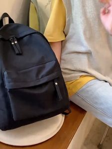 เรียบง่ายใหม่แบรนด์อินเทรนด์สีทึบกระเป๋านักเรียนนักเรียนความจุขนาดใหญ่กระเป๋าเป้สไตล์วิทยาลัยนักเรียนชายและหญิงเดินทางกระเป๋าเป้สะพายหลัง