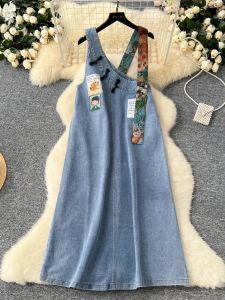 Váy Denim Rộng Rãi in Họa Tiết Cổ Điển Phong Cách Nghệ Thuật Mùa Thu 2024 Váy Midi Không Tay Cổ Chữ V Váy Công Sở Phong Cách Hàn Quốc