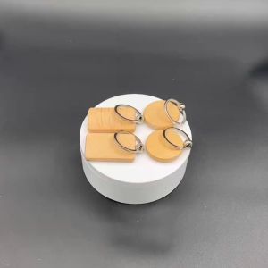 25Pcs/set Wooden Keychain Multi-purpose DIY Bag Keychain Rings Beechwood keychain