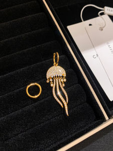 CAFFTI | Asymmetric Diamante Tassel Earrings