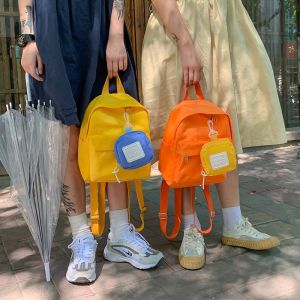 Waterproof Candy Color Small Backpack: A Must-Have for Female Minimalist Travelers