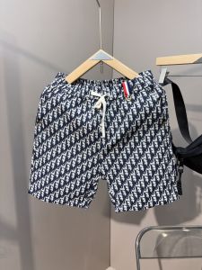 กางเกงขาสั้นชายผ้าลายพิมพ์ใหม่ปี 2024 ทรงตรง กางเกงขาสั้นชายชายหาด ผ้าฝ้ายระบายอากาศได้ดี กางเกงขายาวทรงตรง ทรงหลวม สไตล์ยุโรป