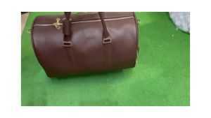 Túi đựng quần áo và giầy golf . túi xách tay MALDINI da bò nhập khẩu.