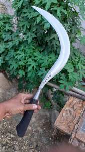 sabit rumput Madura baja per merek bintang lima