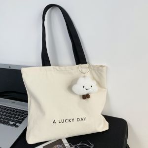 กระเป๋าผ้าใบสไตล์เกาหลีที่มีตัวอักษรต้นฉบับสําหรับผู้ชายและผู้หญิง ความจุใหญ่ ไหล่เดียวสําหรับนักเรียน