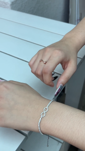 MILLENNE Millennia 2000 Infinity Cubic Zirconia Silver Adjustable Bracelet with 925 Sterling Silver