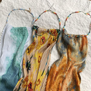 Áo Vest Ngắn Mùa Hè Họa Tiết Sọc Cổ Treo Cho Nữ Thiết Kế Độc Đáo Áo Ba Lỗ Hở Vai Thường Ngày Dệt Kim Mùa Hè 2025