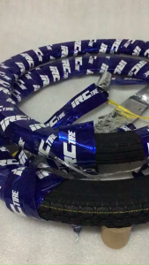 Vỏ trước sau xe DR IRC lốp xe máy màu đen có gai bọc băng keo xanh trắng nhãn hiệu IRC Tire MR. THÀNH.