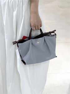 Waterproof Tote Bag Mini Crossbody Shoulder Bag Handbag Dumpling Shape PU Leather Commuter Bag Soft Nylon Fabric Inner Structure