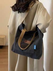 กระเป๋าสะพายข้างผ้าใบหนังสือเดินทางแบบสะพายข้างสำหรับเดินทางและไปทำงาน ความจุขนาดใหญ่ กระเป๋าสะพายข้างแบบสะพายข้างสำหรับผู้ชายและผู้หญิง