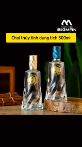 Vỏ chai thủy tinh đựng rượu kiểu chai tròn đáy xoắn hình thang dung tích 500ml nắp bi màu xanh và vàng M87 - Kamglass