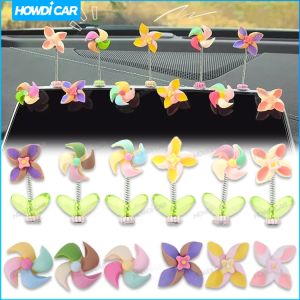 กังหันลมเครื่องประดับรถยนต์คอนโซลกลางรถยนต์แบบหมุนได้อุปกรณ์ตกแต่งสั่นหัวสปริง