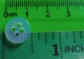 Butones polyester button black/clear sold per 100 Pcs . pang school uniforms and polo shirt.. 
