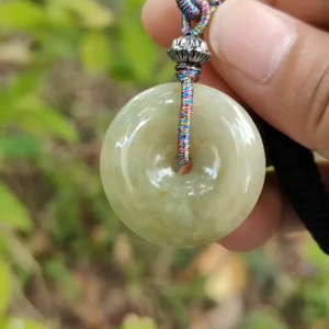 New Listing SG Local Crafted as Donut Pendant on Yellow Natural Type A Jadeite Jade certificate weighs 9.35 grams measurement 27.7 * 6.3 mm (pendant369)