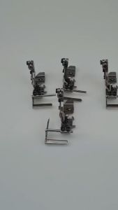 ตีนผีจักรอุตสาหกรรม สำหรับการเข้าสู่ซกคอเสื้อยืด การปรับขนาด ราคาประหยัด 500-1000 บาท