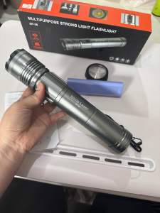Silver metallic high beam flashlight adjustable focus multi-purpose strong light portable design