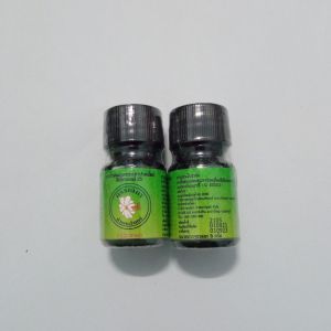 น้ำมันเขียวกรรณิการ์ สูตรเย็น หอมเย็นสดชื่น 20cc. (1 โหลแถม 5cc.1 ขวด)