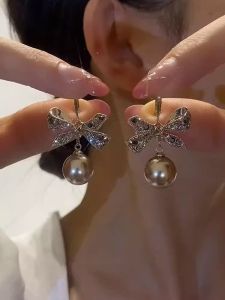 Accessible Luxury Niche Design Fashion Show Elegant Full Diamond Bow Pearl Fancy Earrings for Women Slim Face Earrings