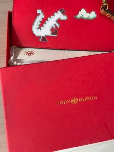 Tory Bhrch Cowhide Women's Purse: Simple & Convenient Fashion Trend