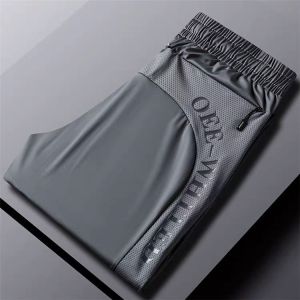 Ice Silk Lightweight Mens Summer Casual Pants Comfortable Breathable Mesh Eyelid Sports Teenagers Trendy Nine Points Cuffed Trousers