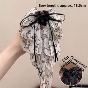 NING ZHOU | Half-Up Hairstyle Hair Clip with Butterfly Bow and Floral Ribbon