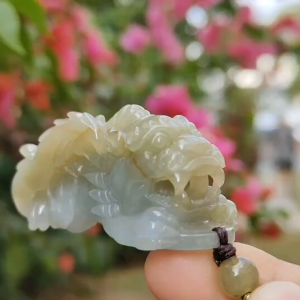 Authentic High Quality Light Green and Brown Natural Type-A Jadeite-Jade crafted as Pixiu for Pendant certificate weighs 54.18 grams measurement 56 * 25.2 * 26.2 mm (pendant303)