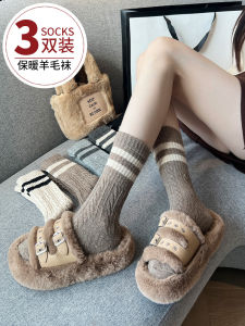 ถุงเท้าผู้หญิงถักนิตติ้งหนาแบบยาวถึงกลางน่อง ลายทาง ทรงหลวม ใส่ในฤดูหนาว ผ้าขนสัตว์ ถุงเท้าแฟชั่น ถุงเท้าผ้าขนสัตว์