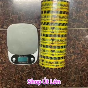 Băng keo hàng dễ vỡ 200yard nặng 1.8kg lõi giấy 5mm rộng 47cm mỗi cây gồm 6 cuộn. Mua từ 2 cây trở lên tặng dao cắt