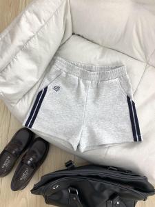 เสื้อยืดคอโปโลแขนสั้นสีขาวสำหรับผู้หญิง ทรงเข้ารูป ทรงพื้นฐาน เสื้อเชิ้ตกระชับสัดส่วน ฤดูร้อน 2025 JK