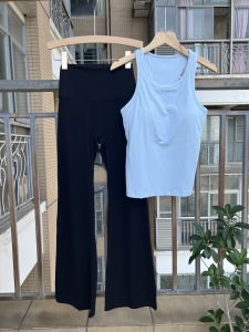 ชุดโยคะแขนกุดทรงหลวมสำหรับผู้หญิงไซส์ใหญ่ กระโปรงทรงเอ ชุดออกกำลังกายวิ่ง ชุดโยคะสีพื้น ชุดออกกำลังกายแบบสวมหัว