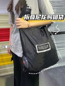 กระเป๋าซิปแบบพับได้ขนาดเล็กสำหรับใส่ของเล็กๆ น่ารักและมีสไตล์ สีสันสดใส กระเป๋าใส่ของทำจากไนลอนอเนกประสงค์สำหรับใส่ของในครัวเรือน