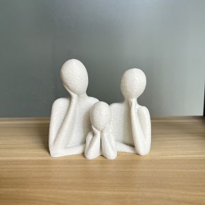 A family decorated wedding statue for three people perfect as an anniversary gift for husband and wife newlyweds or as an art
