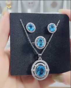 สร้อยคอจี้ทรงกลมเพทายสีฟ้า Kemstone ปรับแหวนสตั๊ดเครื่องประดับตุ้มหูเงินสำหรับชุดเครื่องประดับผู้หญิง