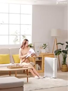 Midea ฮิตเตอร์ร้อน พัดลมร้อน heater Efficient Heating Large Area Coverage Oil Filled Radiator with Clothes Drying Quiet Humidifying Function