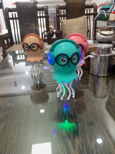 🔥COD🎉 หมึกเต้นเริงระบำไฟสี เสียงเพลง ของเล่นไฟฟ้า ปลดปล่อยความเครียด