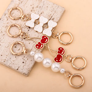 สายคล้องกระเป๋าแฟชั่นรูปหัวใจสตรอว์เบอร์รี สายคล้องกุญแจไข่มุกประดับโบว์สวยงาม สายสะพายกระเป๋าสำหรับผู้หญิง เครื่องประดับ