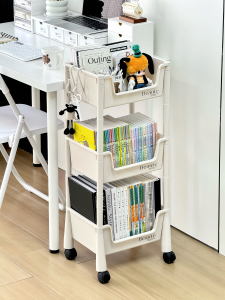 ตู้หนังสือเคลื่อนที่หลายชั้นพร้อมล้อ ตู้รองรับกระเป๋าสตางค์ หนังสือ อุปกรณ์เสริมสำหรับห้องนั่งเล่น รถเข็นขนาดเล็ก วัสดุแผ่นไม้ถุงบล็อก