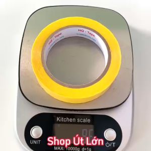1 Cuộn băng keo màu vàng OPP rộng 2.4cm dài 75 mét lõi giấy 3mm giá tại xưởng