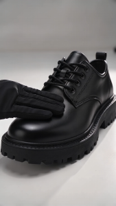 Men Black leather lace-up shoes with thick rugged soles. Suitable for casual or semi-formal wear