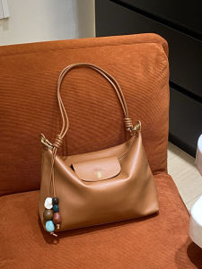 Womens cowhide hobo handbag - stylish soft leather dumpling bag - versatile tote bag for both shoulder and crossbody wear