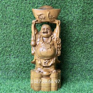 Tượng phật di lặc bưng vàng cao 30cm và 40cm chất liệu gỗ bách xanh nguyên khối